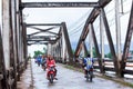 Daily image of Khmer people at old French bridge. Praek Tuek Chhu River.